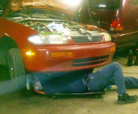 Slugger (Robert Sangster Jr.) getting his hands dirtier, getting to the root of my Mazda’s problem.