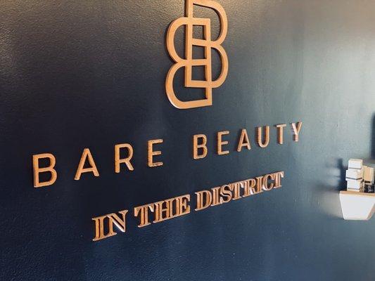 Welcome to Bare Beauty in the District. We are located in the Carlyle shopping plaza inside of Sola Salons.