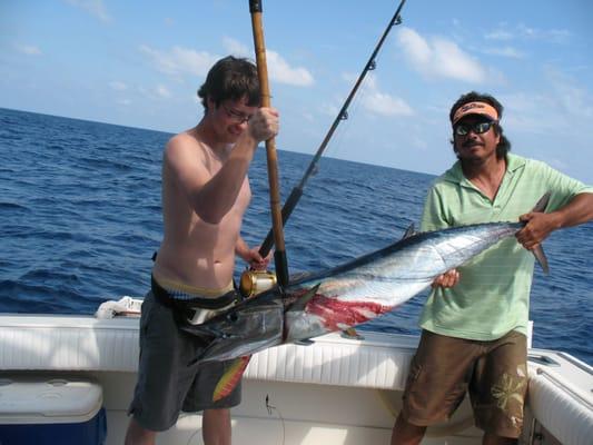 The guys having fun deep sea fishing . Fun in Recovery