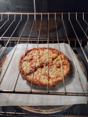 Pineapple pizza that I had to put in the oven immediately after delivery