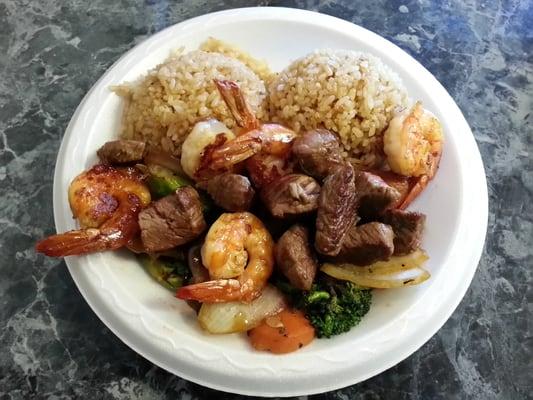 $9.50 - Filet Steak and Jumbo Shrimp - 3 Stars - Price too steep for a 10" paper plate of which 40% is rice.