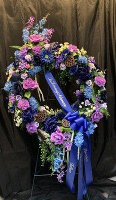 Sympathy tributes available in silk as well as fresh florals.  As shown silk