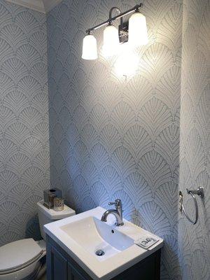 Gorgeous shells wallpaper for their powder room!!