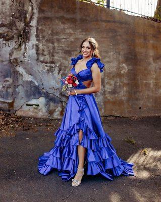 Royal Sherri Hill prom dress with ruffles and side cut outs