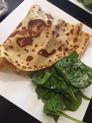 Mediterranean crepe - filled with feta cheese, chicken, tomatoes, spinach, olives, shallots, and tzatziki sauce.