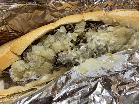 Cheesesteak with fried onions (a lot of them)