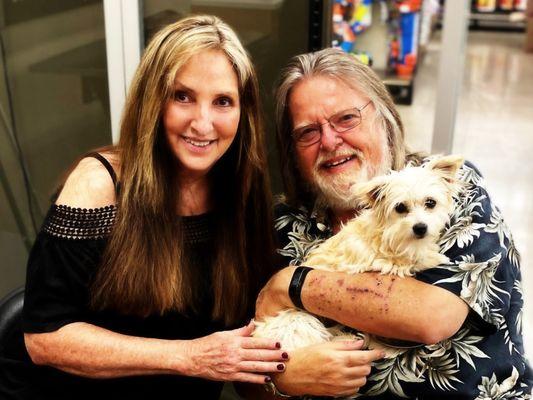 My wife and I at local Petco, getting acquainted with Savannah, a Maltese/poodle mix girl