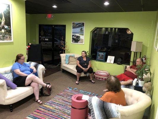 YogaStrong is much more than just a studio; we are a community. Pictured above, members are relaxing in our cozy living space.