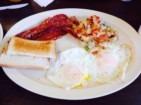 Bacon, two over easy eggs, home fries platter! love it!