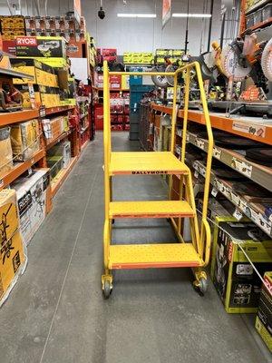 Ladder sitting in aisle