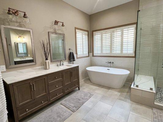 Fully renovated primary bathroom after water damage remediation. A Neutral, Warm, Inviting, and Timeless Design.