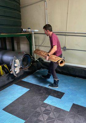 Wet rugs go into our centrifuge to spin dry in just 3 min.