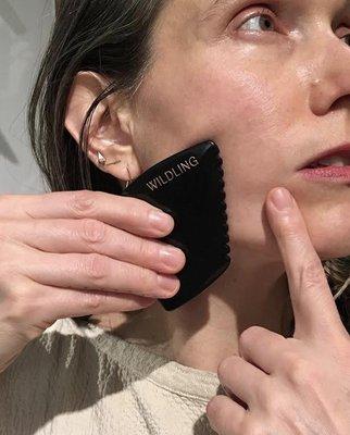 Facial Gua Sha releases tension for circulation and glow.