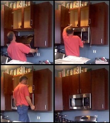 Chris installing our microwave.