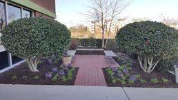 A small garden by the entry for quick breaks to enjoy the view of the Lafayette River.