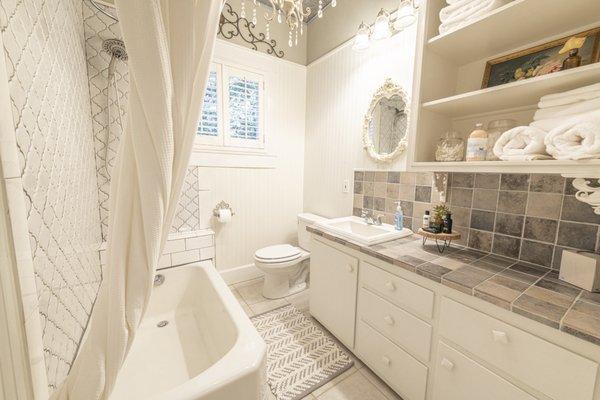 Hall Bathroom with Antique Tub & Tile Shower