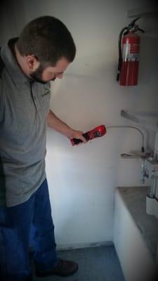 This is the water heater inspection, checking for combustible gas leaks.