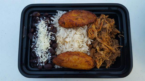 Pabellon ($8): rice, black beans, cheese, beef. Didn't take the photo after dousing it in sauces, but imagine a pool of green...