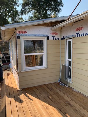 Working on the siding