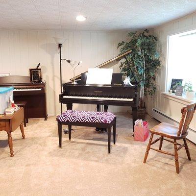 My home studio, equipped with a Chickering baby grand and a Roland digital piano.