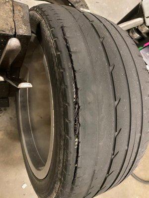 Picture of tire they claimed was new.