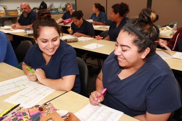 Soon-to-be Medical Assistants working hard on their certification and having fun at HBAS.