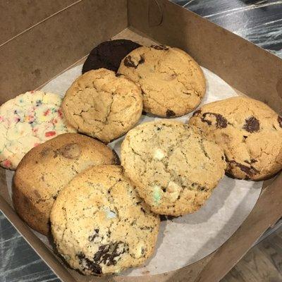 Variety of cookies 8 of our 12 ordered.  Ooopppps,  forgot to take the picture before diving in.