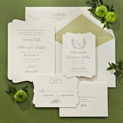 Add a little something special such as a "die cut" shape to your wedding invitation. Crane & Co. "Die Cut Ecru" Wedding Invitations.