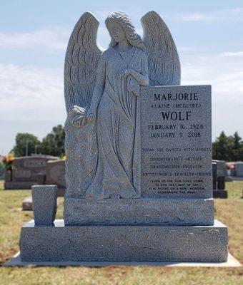 Beautiful fully carved angel memorial, made from Gray Granite.