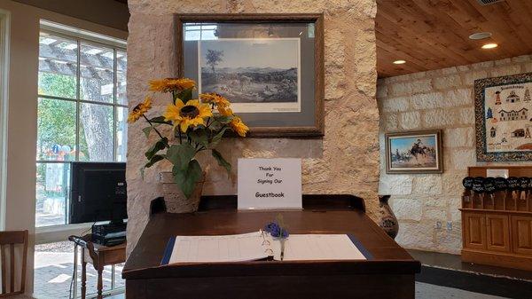 Visitor center guest book signing