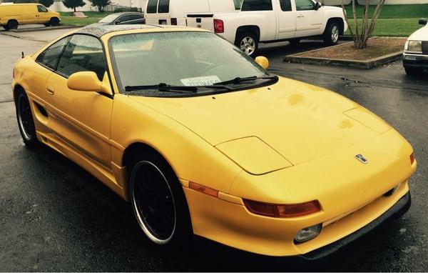 This is a 1991 Toyota MR2 turbo with a Lamborghini yellow custom paint...entire car has been redone very clean!