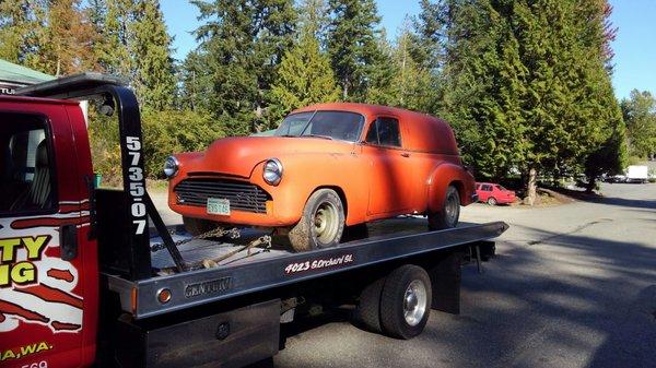 Another classic being towed for customer. 50 Chevy sedan delivery