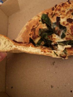 "Hand tossed" garlic parm pizza with spinach and feta with "extra sauce". Where's the sauce? Where's the hand-tossed crust?