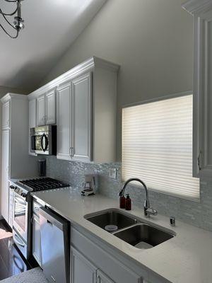 Kitchen walls painted on 05/04. Countertops, floor and cabinets were protected. No roller marks. Looks great!