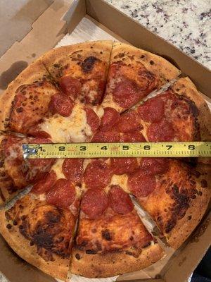 12" Pizza with 6" of toppings.