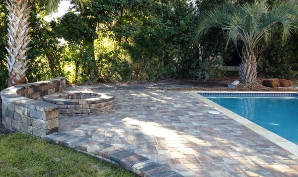 Outdoor living spaces can be created with the addition of firepits, sitting walls, patios, etc.