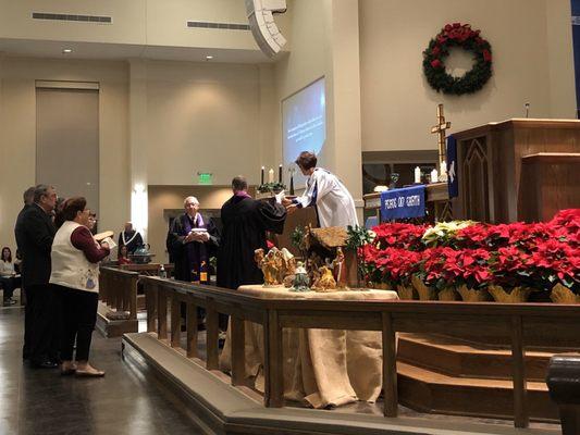 Preparing communion during the Christmas Eve Service 2019