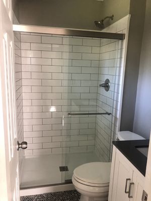 Small half bath turned into a full bath, simple but clean!