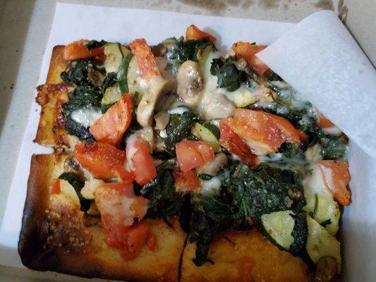 Zucchini,  mushroom,  tomatoes and spinach flatbread