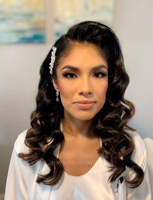 Glam waves and a good amount to makeup application for this stunning bride Patty.