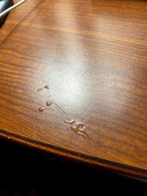 Semen stain on the nightstand.