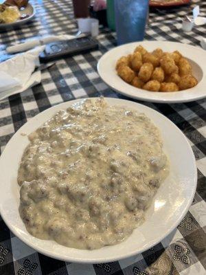 Sausage Gravy w/ biscuits and a side of tater tots.