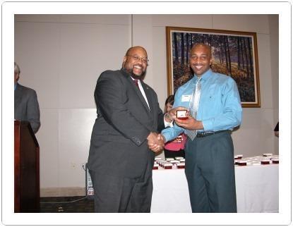 Vice Chancellor Elwyn C. Lee awards D Ivan Young his class ring at the University of Houston Ring Ceremony at the UH Alumni C...