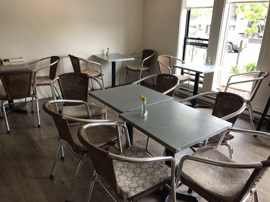 Indoor seating with a view of pedestrian traffic.