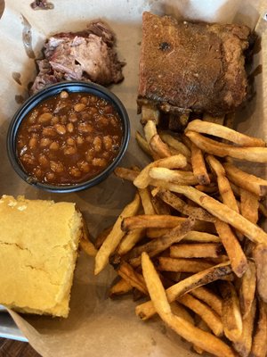 Clockwise from upper left: Moist Brisket, Pork Ribs, Fries, Corn Bread, Baked Beans