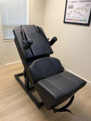 Back on Trac Chair - Mechanical Traction -designed to gently stretch the spine, joints, and muscles of the back and hips.