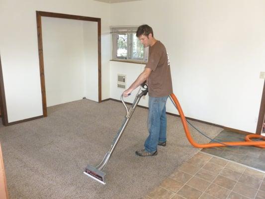 Kevin, our Certified Carpet Technician steam cleans and extracts the water from a carpet