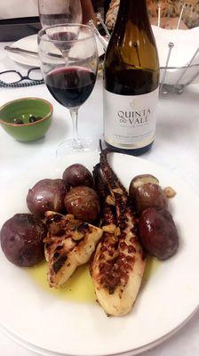 Polvo à lagareiro (grilled octopus, with baked potatoes drizzled in warm olive oil and sautéed garlic). One of my favorites!