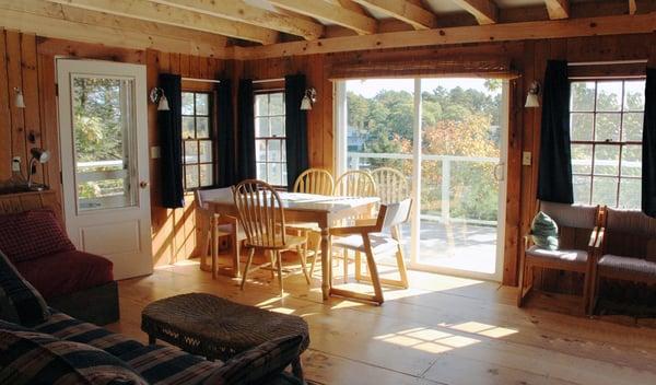 Living room of the Deck Cottage at Harborfields. It features a second-story master bedroom with modern en suite bathroom and great views!