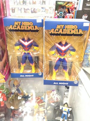 Two All Might My Hero Academia action figures & some Dragon Ball figures below.